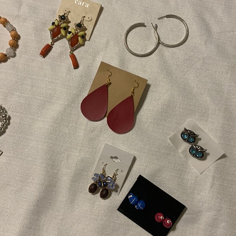 Bundle of seven earrings and 10 bracelets